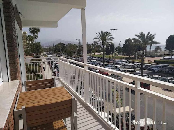 Enjoy a peaceful retreat with a balcony offering a view of the surrounding area.