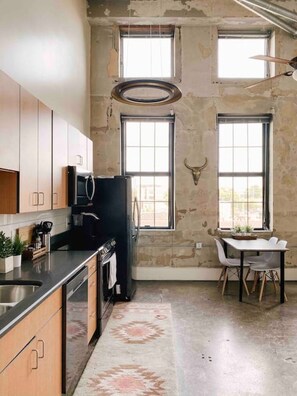 Fridge, microwave, oven, stovetop - Modern Gay St Loft w/ View (Knoxville)