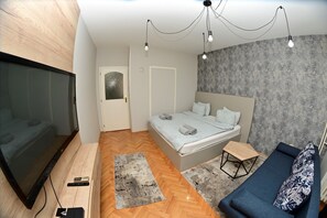 Business Studio | Living area | 45-inch flat-screen TV with cable channels, TV - Apartman Index (Novi Sad)