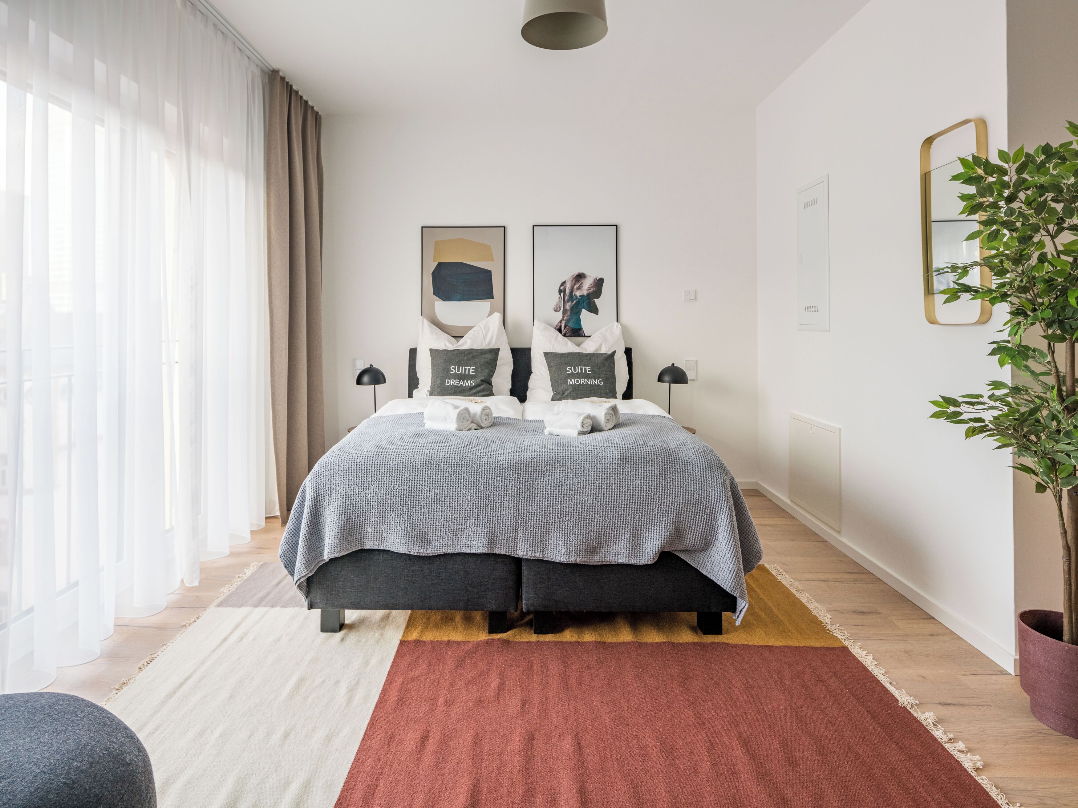Suite L | Individually decorated, individually furnished, desk, laptop workspace