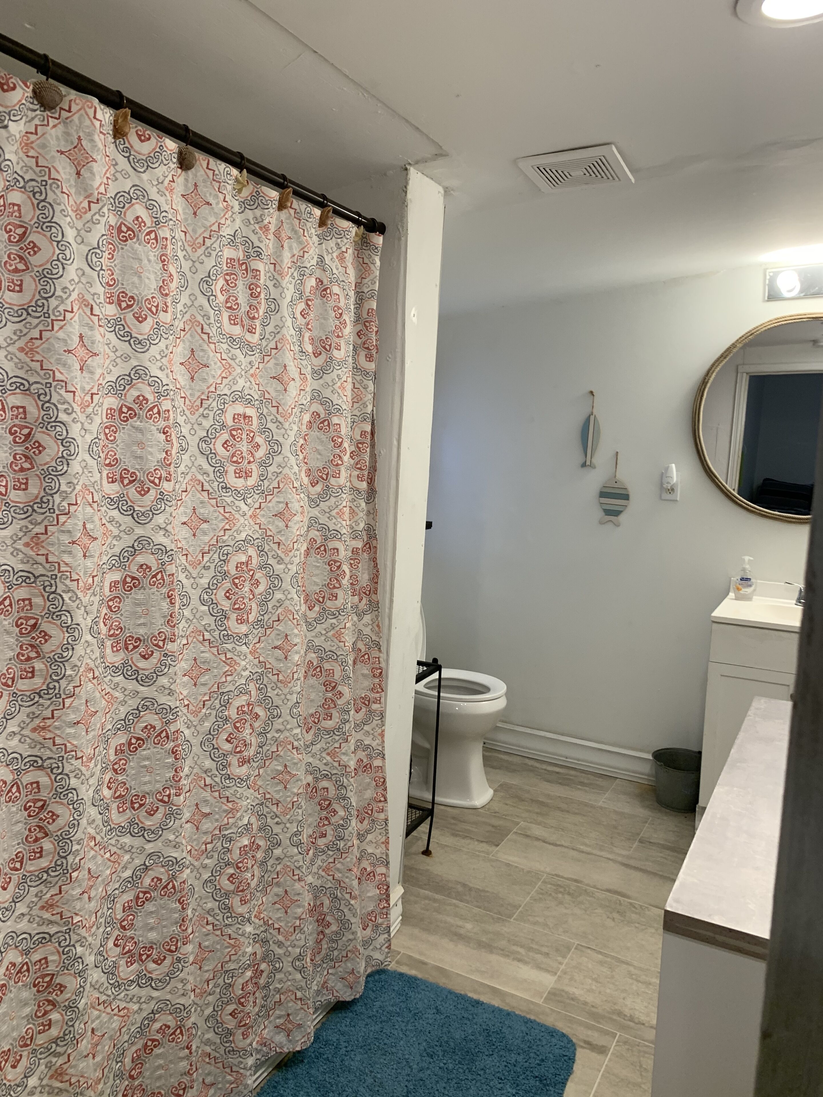 Combined shower/tub, hair dryer, towels, soap