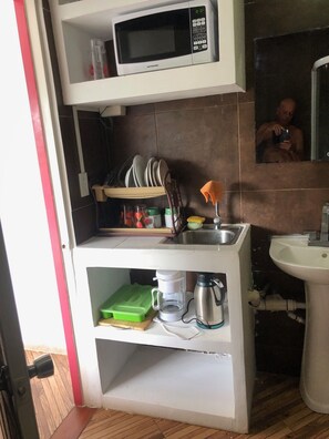 Fridge, microwave, coffee/tea maker, dining tables