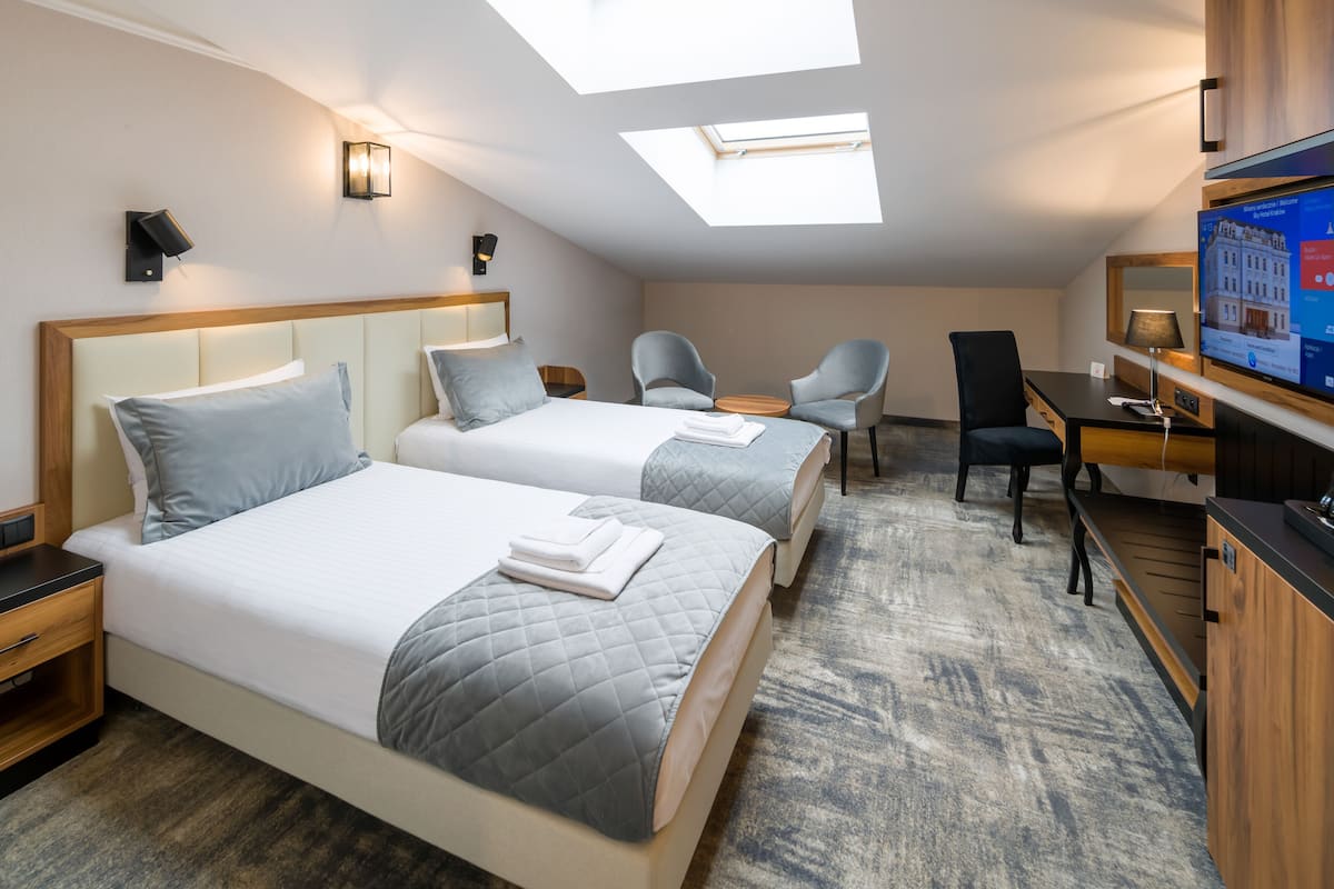 Standard Twin Room (Attic) | Memory foam beds, minibar, in-room safe, individually decorated