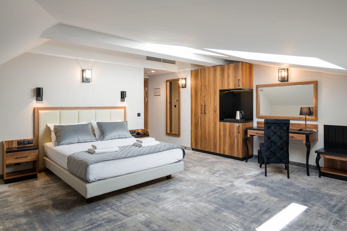 Standard Double Room (Attic) | Memory foam beds, minibar, in-room safe, individually decorated