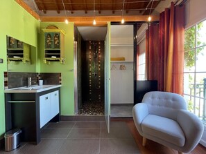 Shower, hair dryer, towels, toilet paper