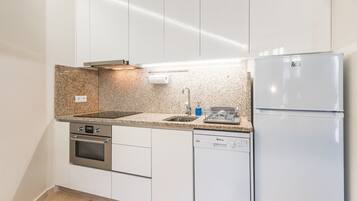 Oven, coffee/tea maker, toaster, cookware/dishes/utensils