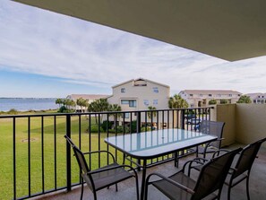 Outdoor dining - Santa Rosa Dunes #1022 | Bay Front + Amazing Views (Pensacola Beach)