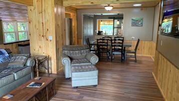 Smart TV, fireplace, books, offices