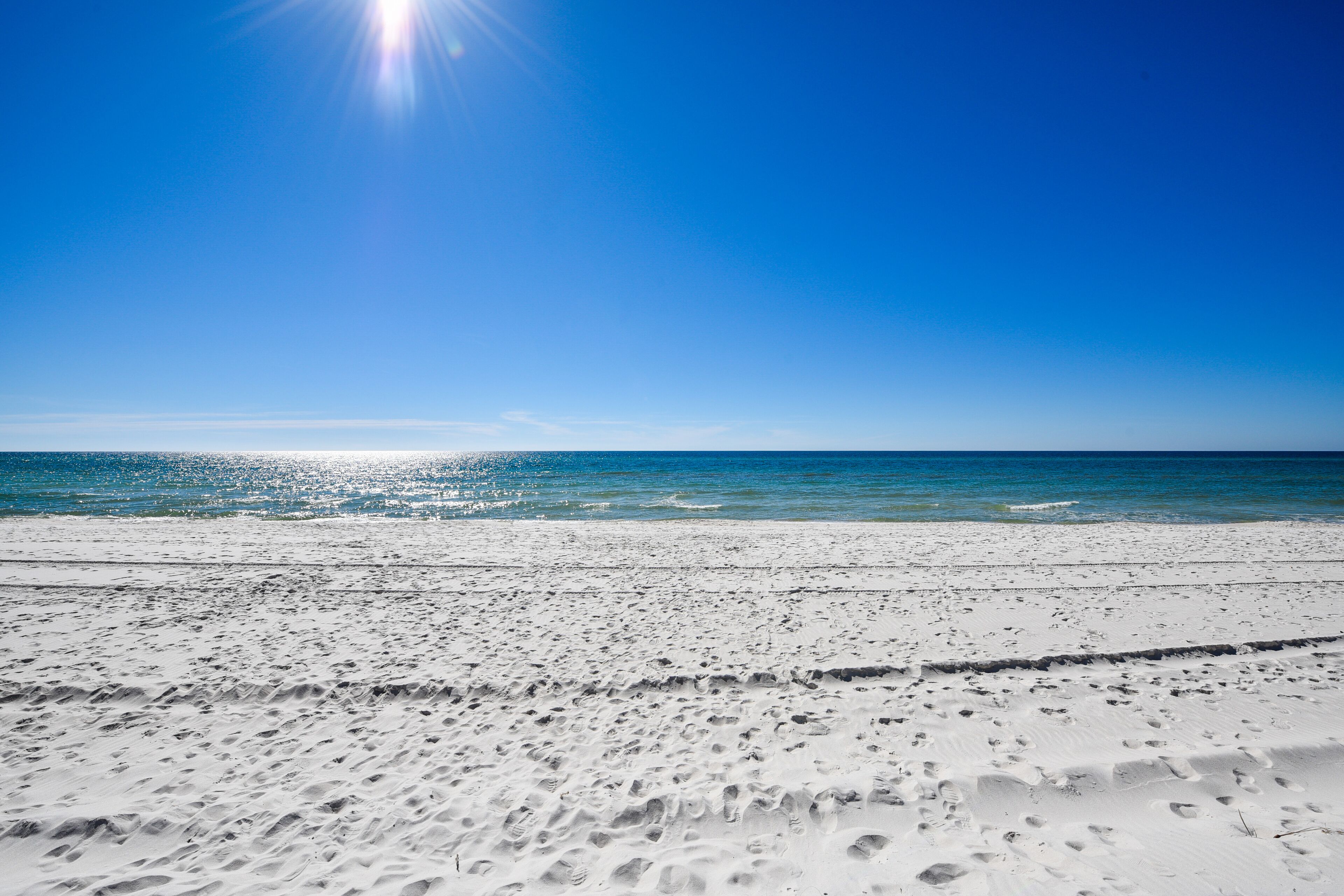 On the beach, white sand