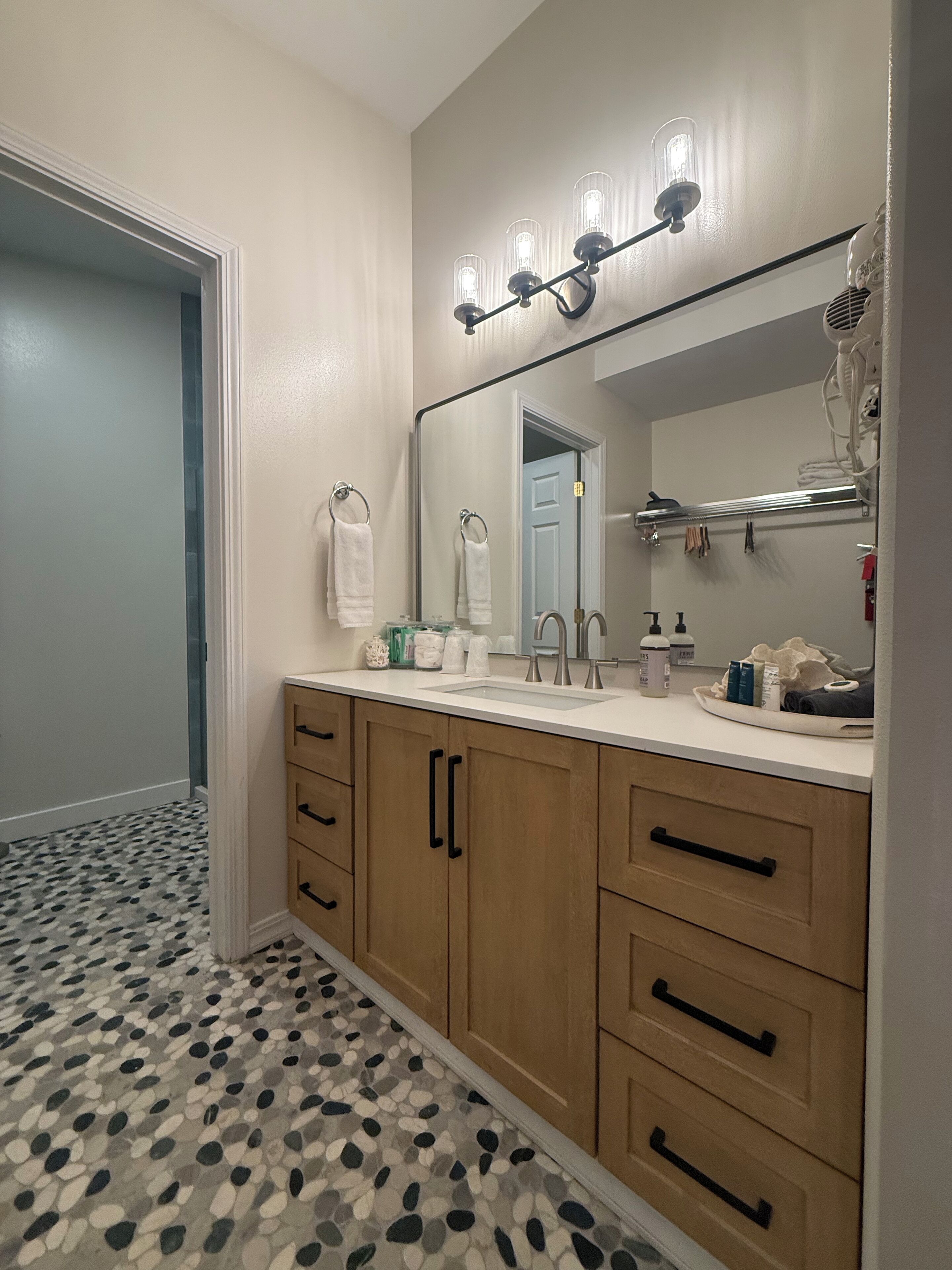 Hair dryer, towels, soap, shampoo