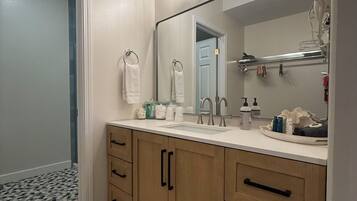 Hair dryer, towels, soap, shampoo