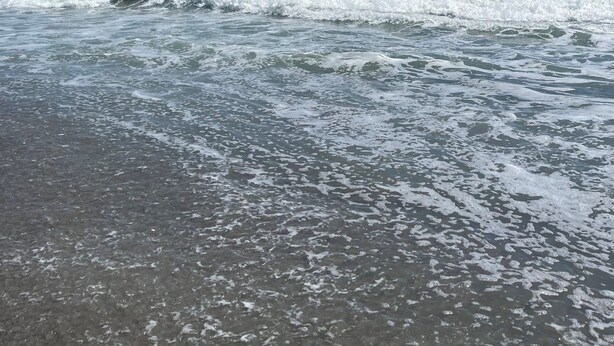 A beach with waves and a clear sky. - 3 bedroom condo in cocoa beach (Cocoa Beach)