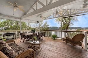 Main deck. Outdoor dining & lounge. Stunning views. Ceiling fans, heater & BBQ.