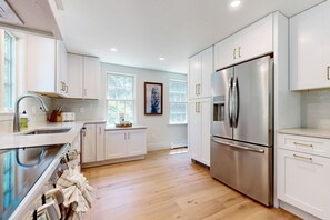 Fridge, microwave, oven, stovetop - Two-story home w/new kitchen, washer/dryer, large yard, & pool table (Orleans)