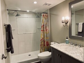 Shower, hair dryer, towels, soap