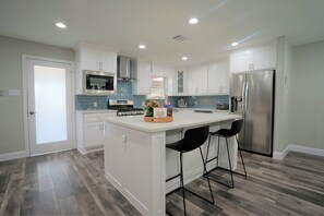 Fridge, microwave, oven, stovetop - Luxury retreat with a swim spa and game room! (Richland Hills)