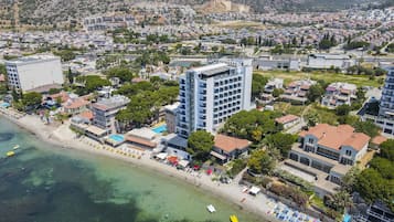 On the beach, white sand, free beach shuttle, sun loungers