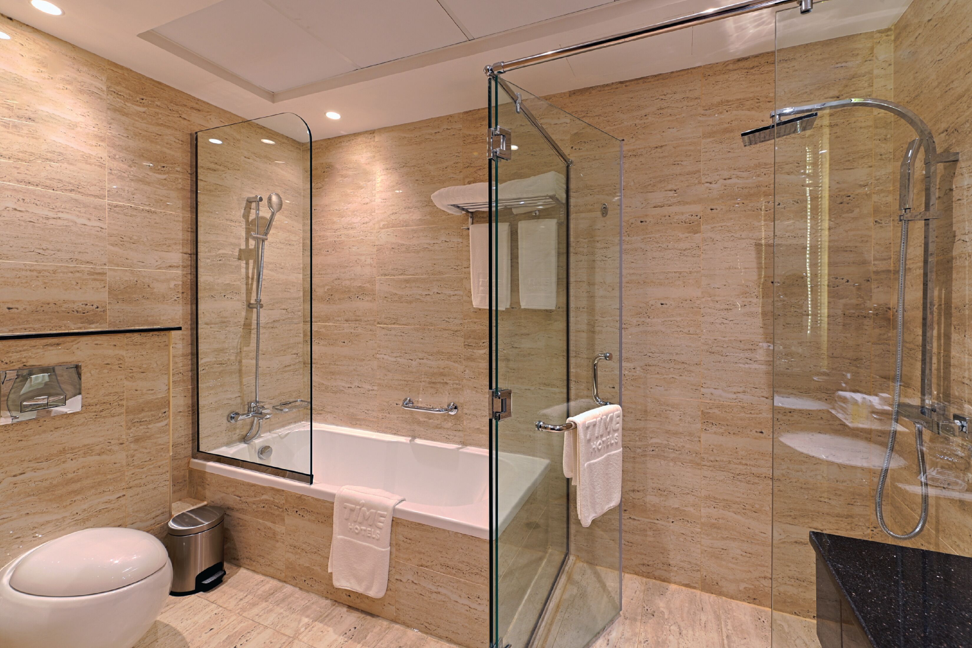 rainfall showerhead, free toiletries, hair dryer, bathrobes