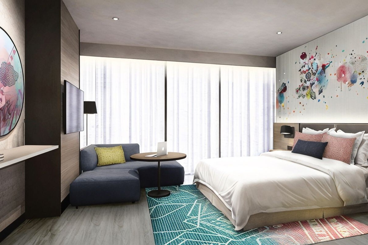 Ropa de cama de alta calidad y caja de seguridad en la habitación 