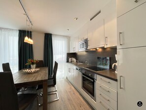 Strandvilla Baabe 14 - MEERBAABE | Private kitchen | Full-size fridge, microwave, oven, stovetop