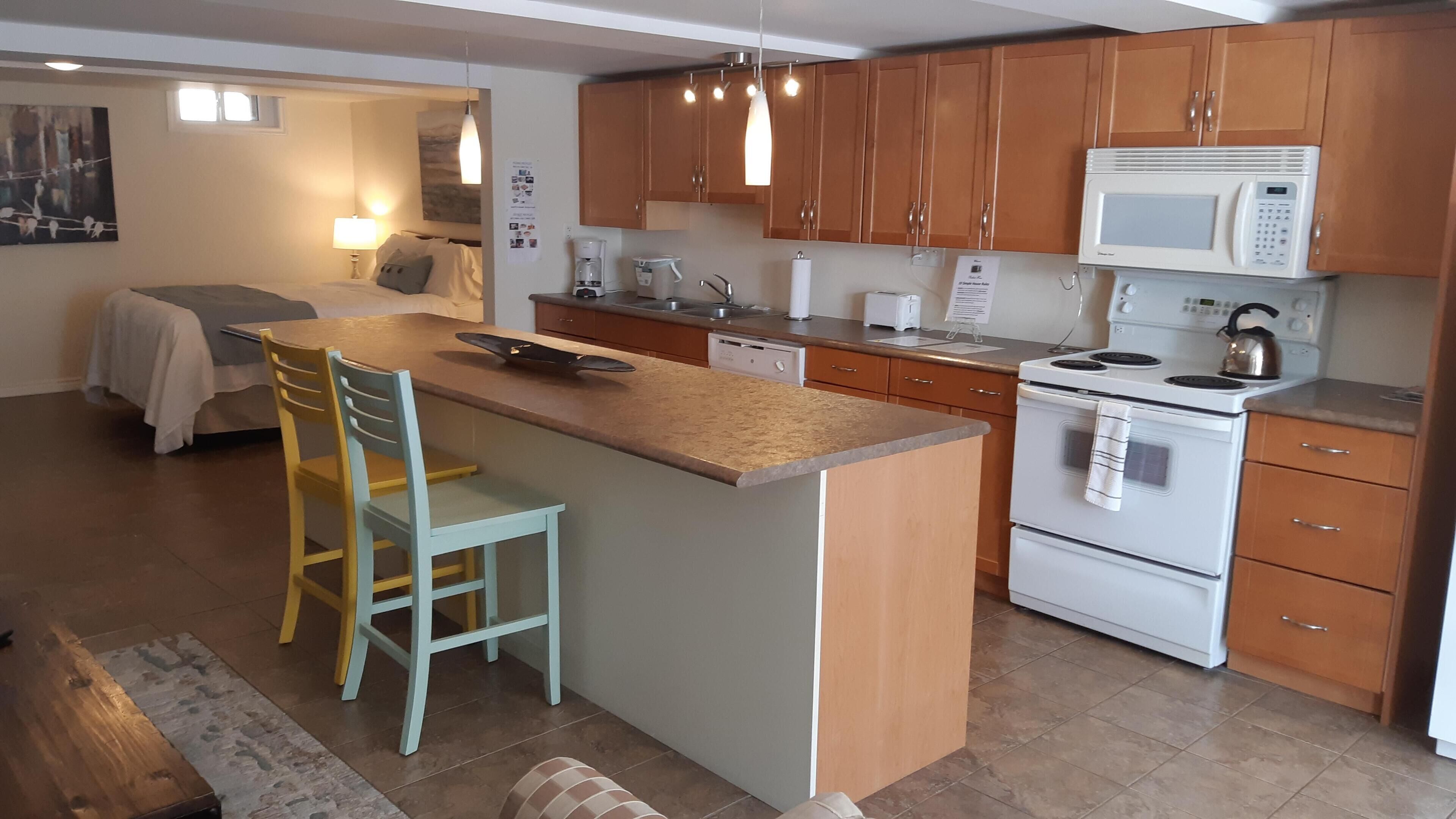 Cozy & Bright Suite w/ Heated Floors, Gas Fireplace, and Spacious Backyard!