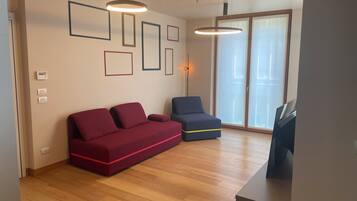 Panoramic Condo | Living area | 45-inch flat-screen TV with digital channels, TV, heated floors