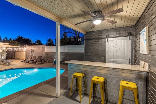 Enjoy drinks at the outdoor cabana