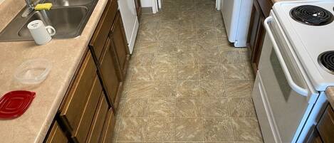 Oven, stovetop, dining tables