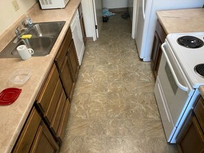 Oven, stovetop, dining tables