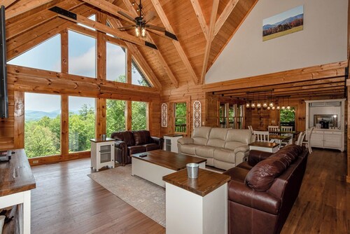 This 5 bedroom 5 bath log cabin with spectacular views, secluded, & Hot-tub