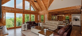 This 5 bedroom 5 bath log cabin with spectacular views, secluded, & Hot-tub