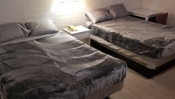 1 chambre, fer et planche Ă repasser, Wi-Fi gratuit, draps fournis