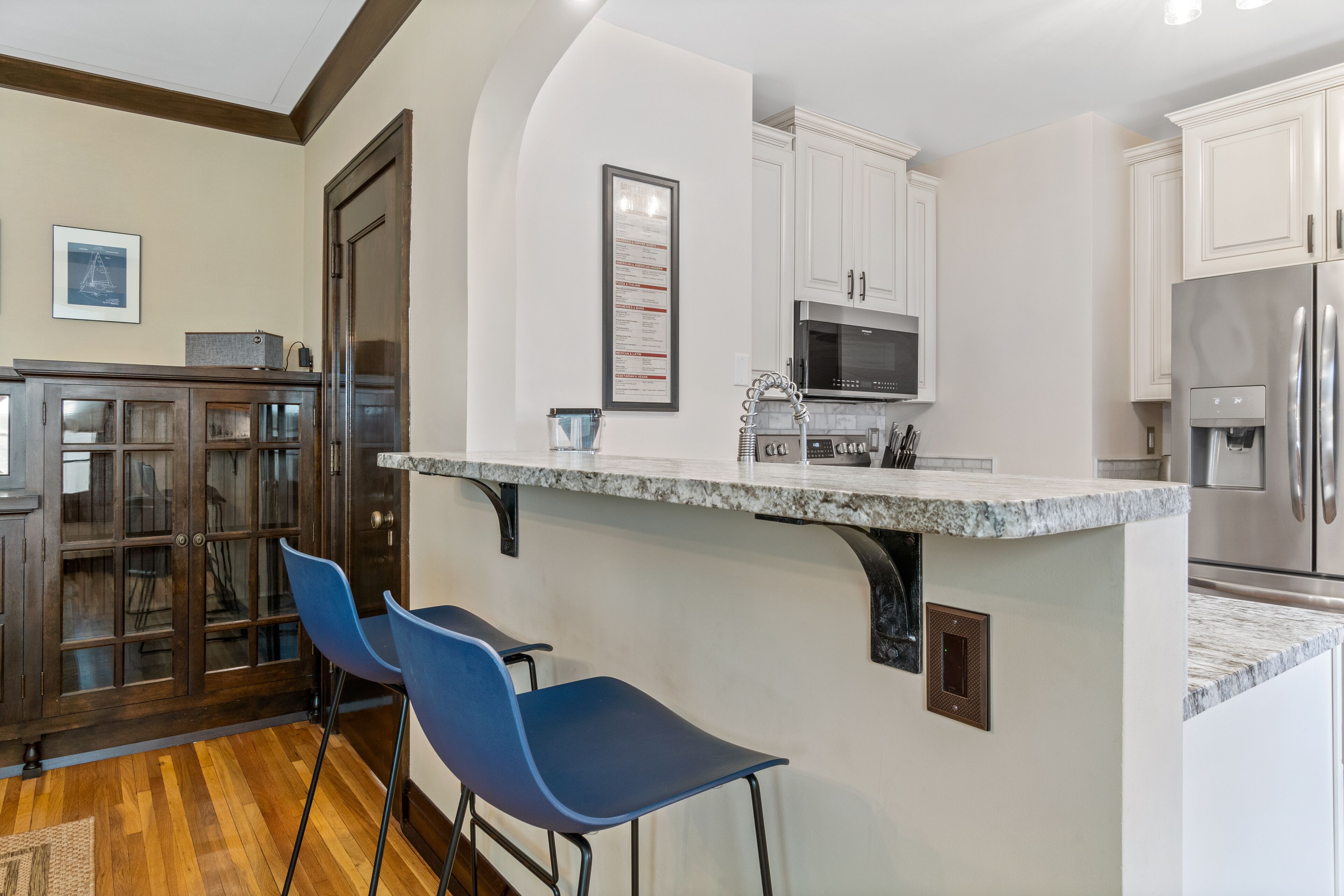 Sophisticated Upstairs Flat in Tudor-Style Duplex