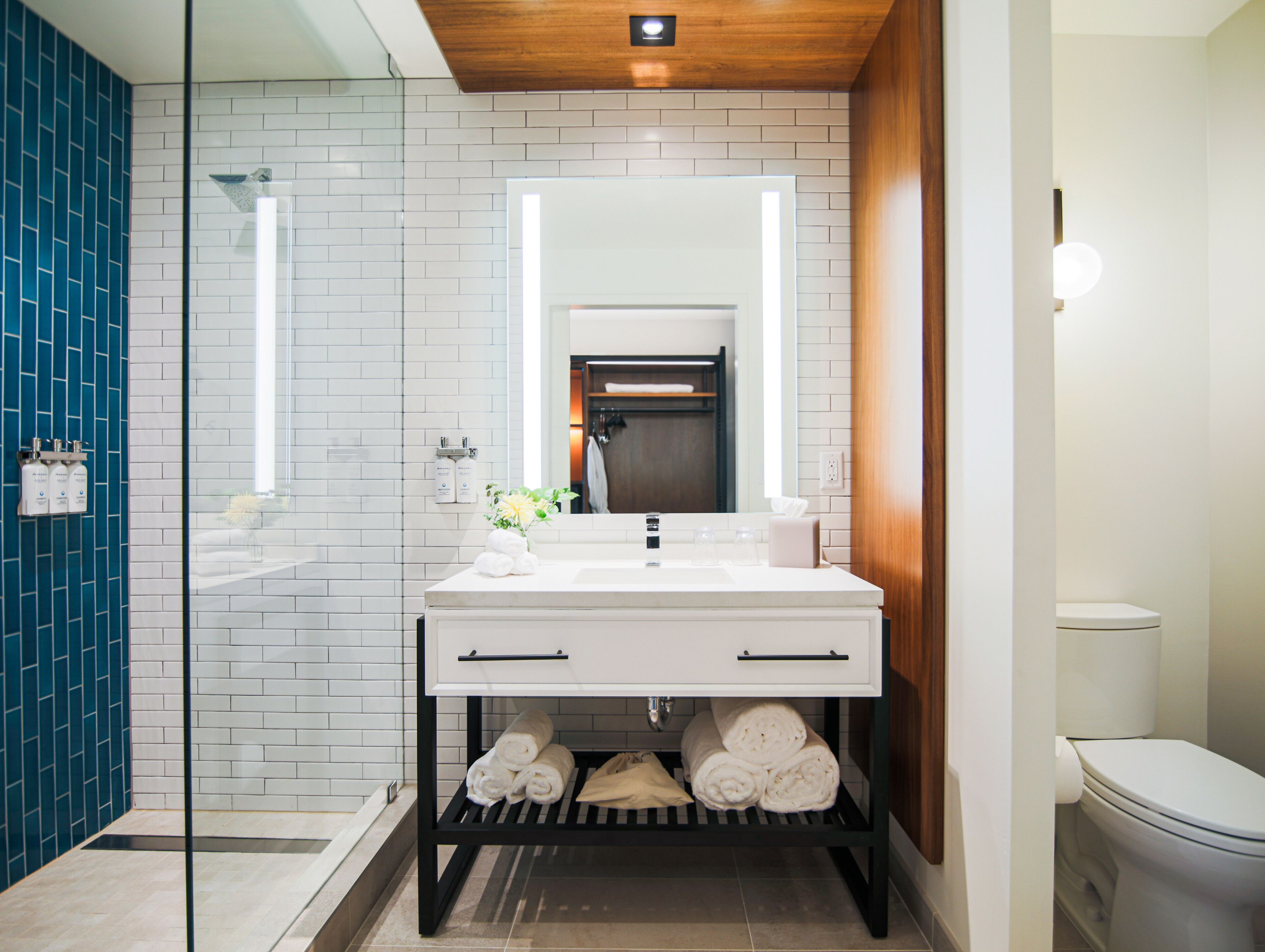 rainfall showerhead, designer toiletries, hair dryer, bathrobes