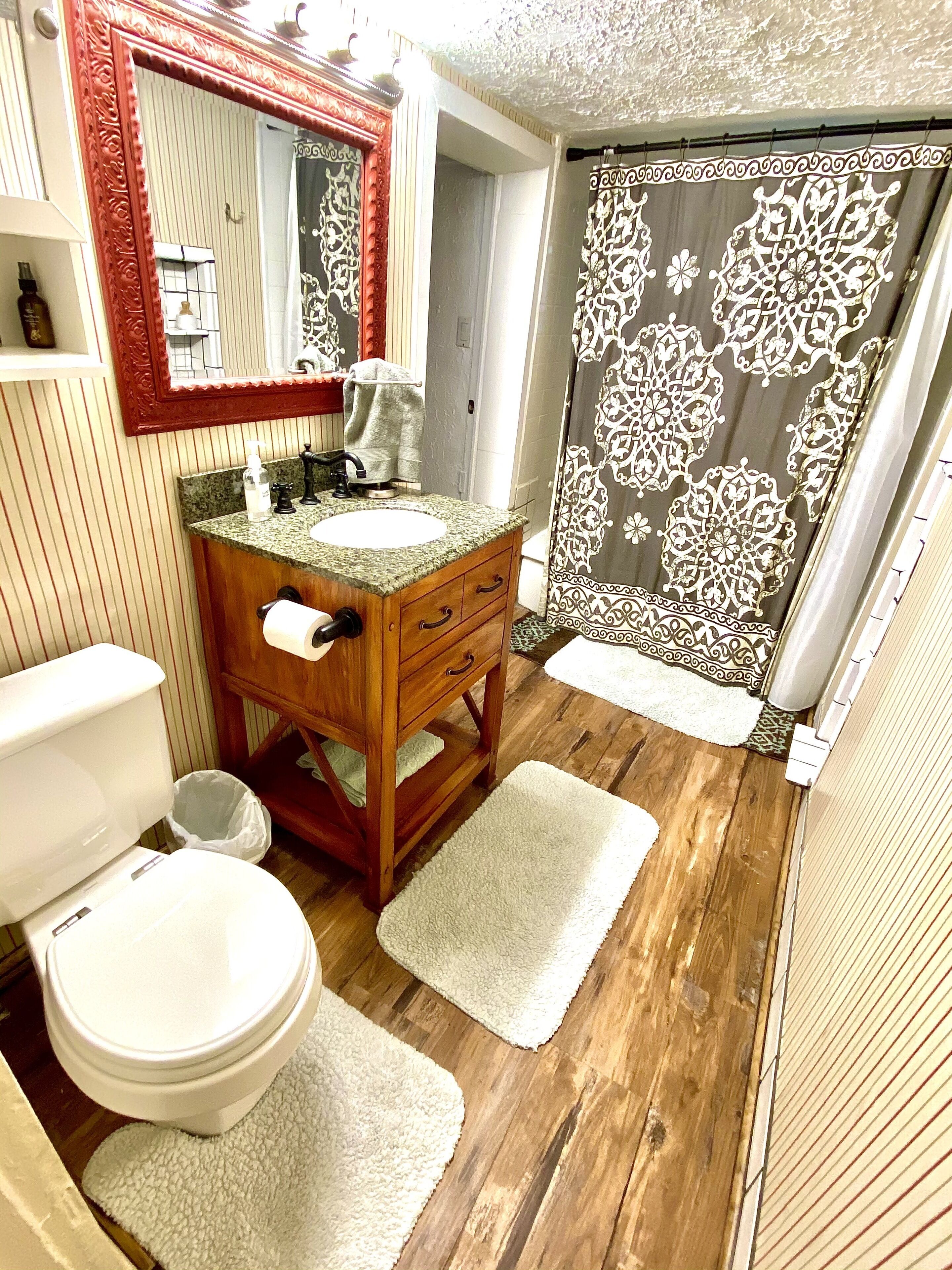 Bathtub, hair dryer, towels, soap