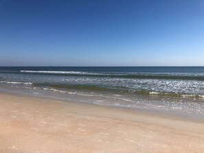 On the beach, sun-loungers, beach towels