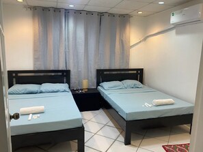 1 chambre, fer et planche à repasser, Wi-Fi gratuit, draps fournis