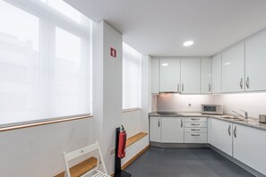 Fridge, microwave, stovetop, cookware/dishes/utensils