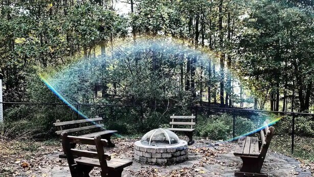 A park with a circular fire pit, benches, and a wooden fence. - Private Retreat w/Pool, Hot Tub & Fire Pit, Perfect for Groups! (Warwick)