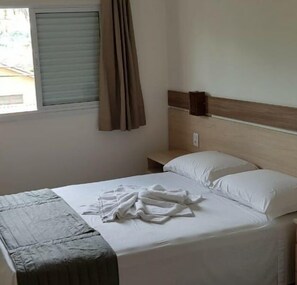 Double Room, Balcony | Minibar, desk, free WiFi, bed sheets - Pousada Canto da Praça (Bertioga)