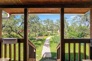 Enjoy a serene garden view from this tranquil outdoor space.