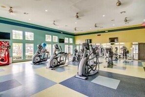 A gym with stationary bikes, treadmills, and weight machines. - Medical Center/NRG/Museum District (Houston)