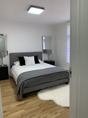 2 bedrooms, desk, iron/ironing board, travel crib