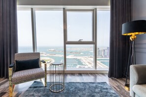 Basic Apartment, Multiple Beds, Sea View | Living room | TV