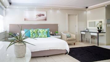 Executive Studio Suite | Desk, iron/ironing board