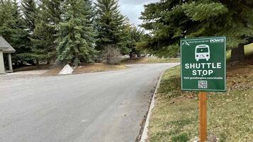 A shuttle stop sign for Grand Targhee Resort.