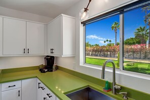 Fridge, microwave, oven, stovetop - Seven Palms Estate- Ultra-Chic, Mid-century- Resort Style Pool, Spa & Fire Pit 2BD/2BTH (Palm Springs)