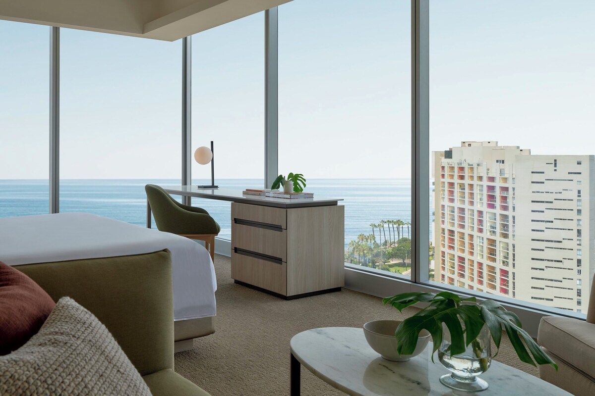 Suite, 1 King Bed, Sea View | In-room safe, desk, laptop workspace, blackout drapes
