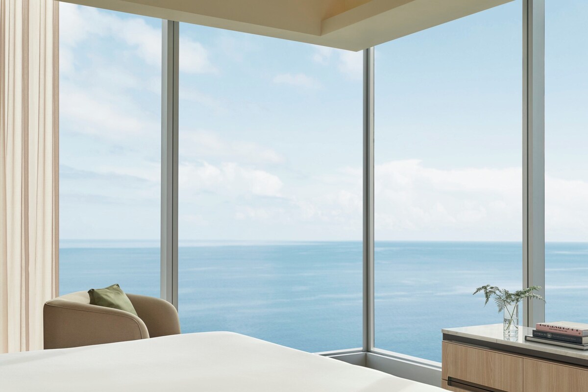 Suite, 1 King Bed with Sofa bed, Sea View (SOUMA) | In-room safe, desk, laptop workspace, blackout drapes