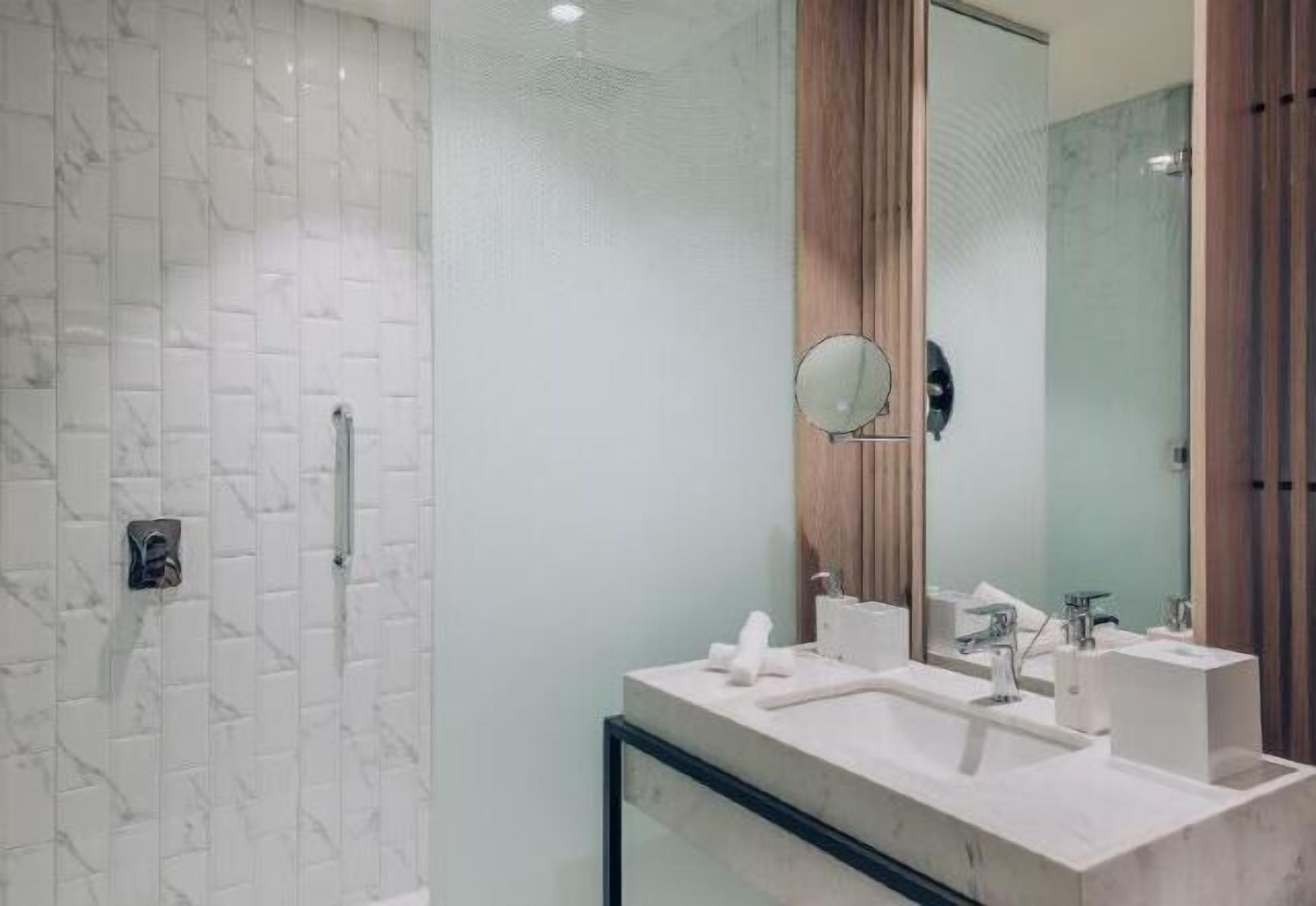 Shower, rainfall showerhead, eco-friendly toiletries, hair dryer